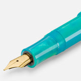 Gold-plated nib with the Kaweco logo, set in a barrel in shades of turquoise.