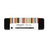 A black metal tin with the inscription Caran d’Ache + Paul Smith.