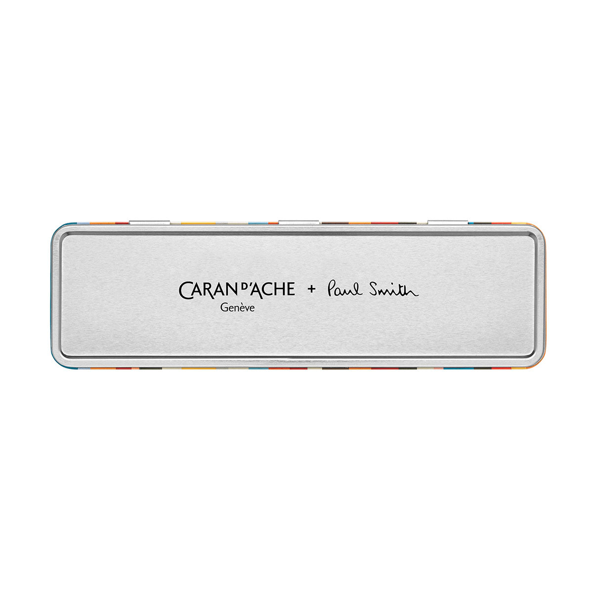 Srebrna, metalowa puszka z napisem Caran d'Ache + Paul Smith.