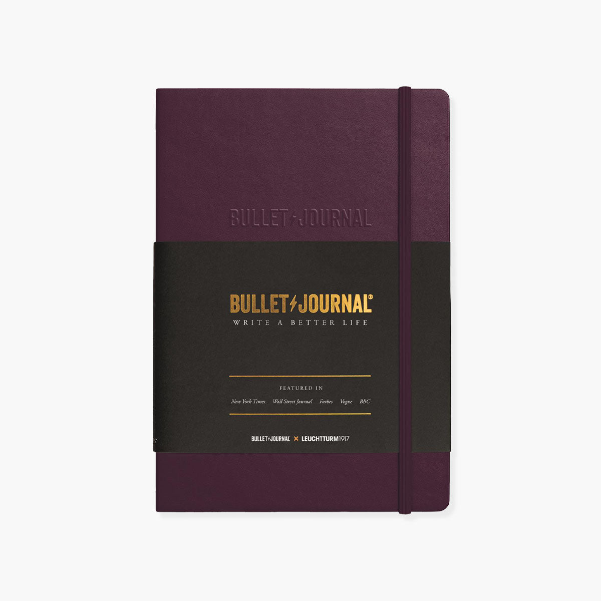Bullet Journal od marki Leuchtturm1917 w kolorze fioletowym zamykany na elastyczną gumkę.