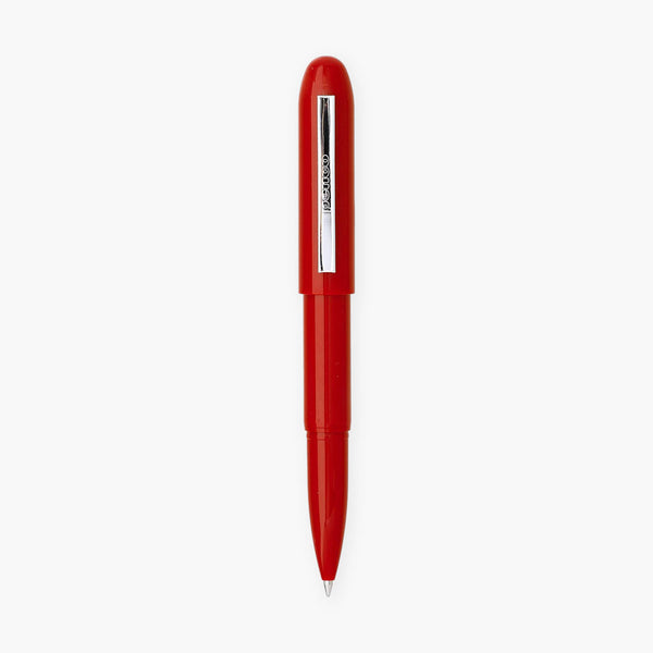 Red ballpoint pen in a bullet-like shape with a silver clip engraved with the Penco logo.
