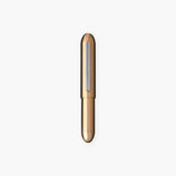 Brass, gold-colored pen in a bullet-like shape with a silver clip engraved with the Penco logo.