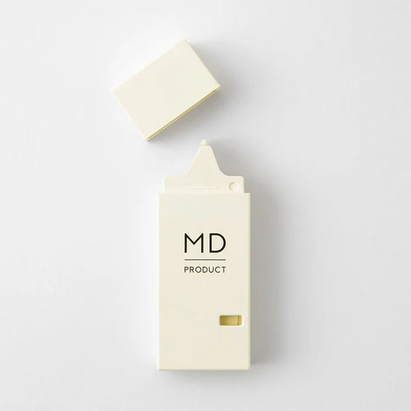 Opened MD Product concealer in a beige, rectangular package with a black MD Product label.