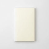 Cover of a cream-colored notebook by the Japanese brand Midori.