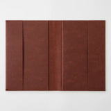 An open chocolate-colored paper cover in a A5 format.