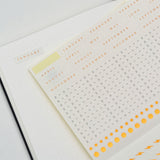 A Bullet Journal notebook with 120 gsm dotted paper.