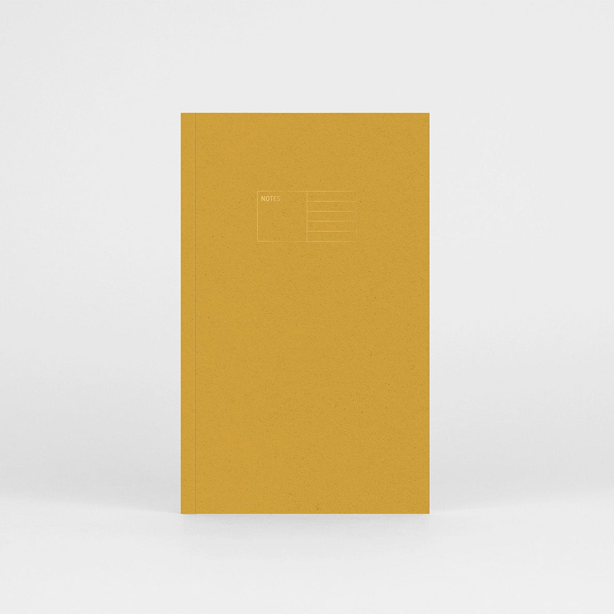 Notes Copper w miękkiej oprawie w kolorze żółtym z miedzianymi detalami.