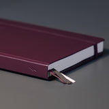 A hardcover notebook made of faux leather with the “Bullet Journal” inscription.