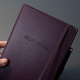 A hardcover notebook made of faux leather with the “Bullet Journal” inscription.
