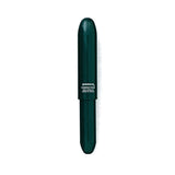 A green plastic pen in a bullet-like shape with white lettering.