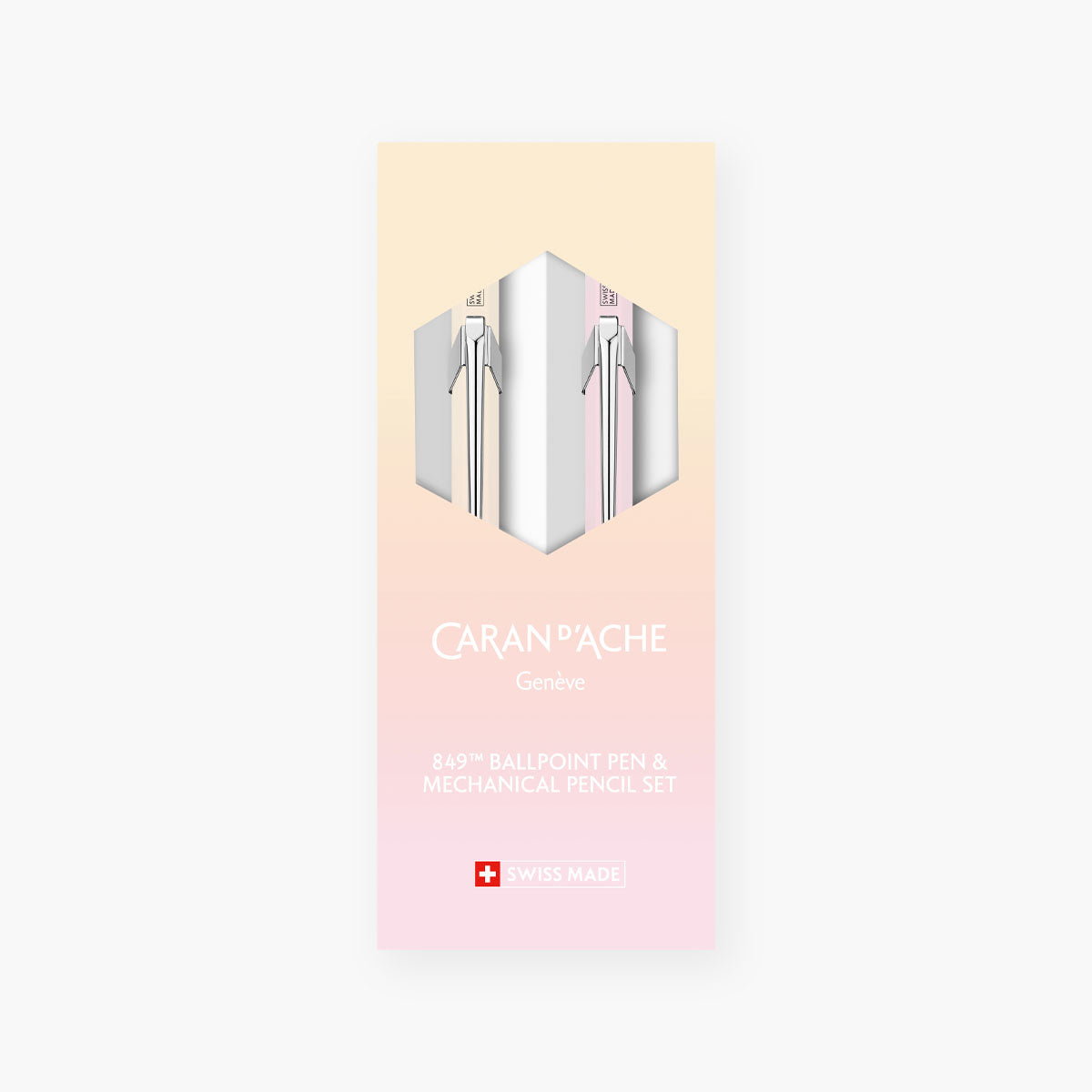 Kartonowe pudełeczko w kolorach w odcieniach różu i pomarańczu.