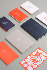 Notebooks and stickers with a moon motif from the Luna collection.