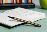 Aluminium ballpoint pen with colourful stripes and a black finish from the Caran d’Ache & Paul Smith collection.