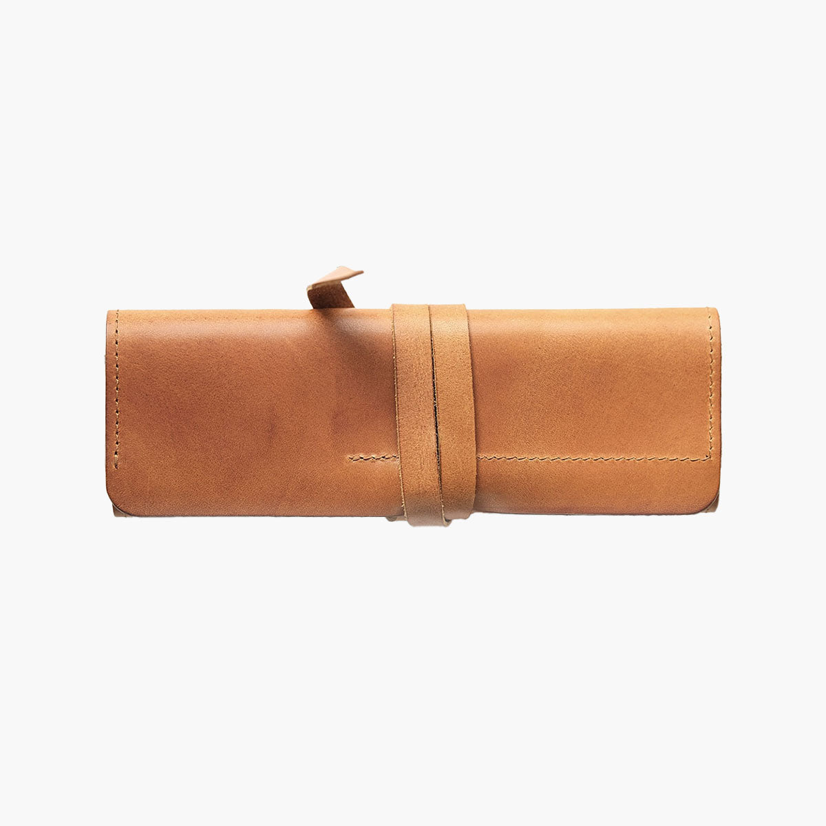 Skórzany piórnik rolowany – koniakowy, HUGBAG, papierniczy design