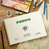 A sketchbook with the Penco brand name on the cover along with other drawing accessories.