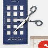 Steel scissors with grey handles and the Penco brand name engraved on them.