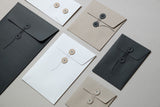 ECO ENVELOPES WITH BUTTONS Q, Papierniczeni, home office, stationery design